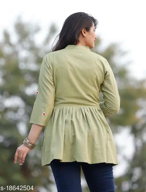 Light green rayon embroidery crop top with three-quarter sleeves, India origin