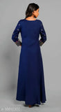 Blue IBBA Women's embroidered rayon A-line kurta with three-quarter sleeves, traditional Indian attire on model