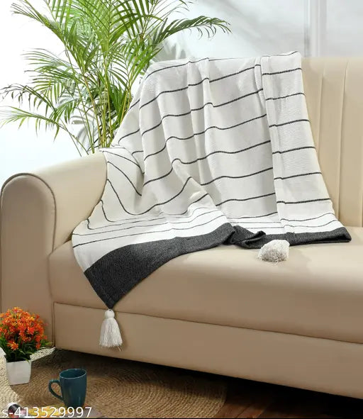 Eco-friendly premium cotton boho throw, 50x60 inches, abstract pattern with decorative fringe finish, versatile for home decor, yoga, outdoor, picnic use