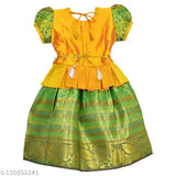 Homely Girls Traditional PATTU LANGA PATTU PAVADAI Lehenga Choli - Cotton silk South Indian dress for girls, zari-woven polka pattern on display