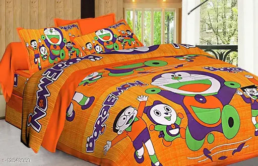 Doraemon cartoon printed orange cotton double bedsheet with matching pillows, vibrant design for kids' room on queen-sized bed