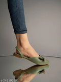 Green synthetic slingback mules, stylish decor bow and pointed toe for women and girls. Perfect for everyday comfort and fashion. Made in India