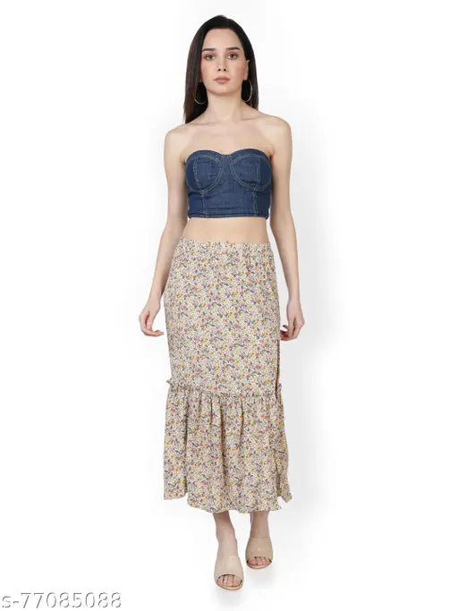 Polyester floral printed side-slit frill skirt, midi length with ruffles and elastic waist, perfect for casual events. Style up your wardrobe." (106 characters)