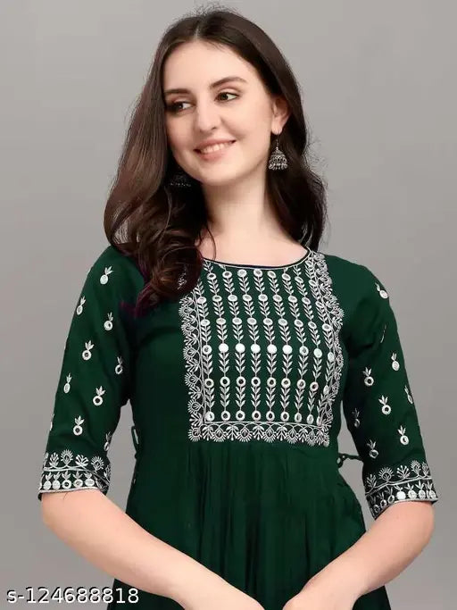Green rayon embroidered kurti, three-quarter sleeves, Indian design on display stand