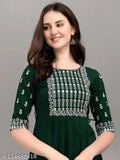 Green rayon embroidered kurti, three-quarter sleeves, Indian design on display stand