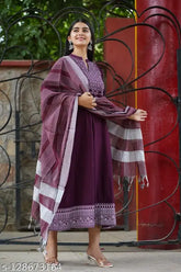 Rayon Anarkali gown with printed net, three-quarter sleeves, embroidered line kurta and matching dupatta. Indian women's fashion on display