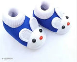 Stylish PU blue baby booties with embellished net pattern, soft and protective for 0-12 month old infants