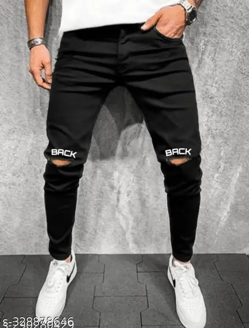 Black denim knee-cut jeans for men by KODO JEANS, solid design with placement print. High-quality manufacturing as per reviews from Gillkart." (114 characters)