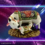 Marble dust/Polyresin Nandi Pooja figurine, designer stone-studded cow & calf statue (5 inch, multicolor). Indoor spiritual decor showpiece for home or gift