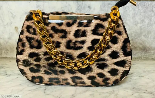 Acrylic animal print sling bag, free size, 1 compartment, front zippered pocket, adjustable strap. Indian-origin stylish accessory for girls and women