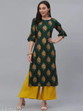Rayon kurta set with printed net design, featuring three-quarter sleeves and green/mustard yellow colorway. Green rayon palazzo bottoms with slip-on closure, originating from India