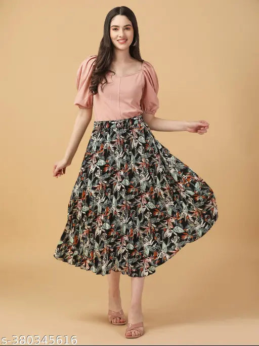 Printed polyester midi skirt for women, casual and regular fit with pleated design, mid-waist style, ideal for any occasion. Size: 28,30,32,34,36,38 (inches). Made in India
