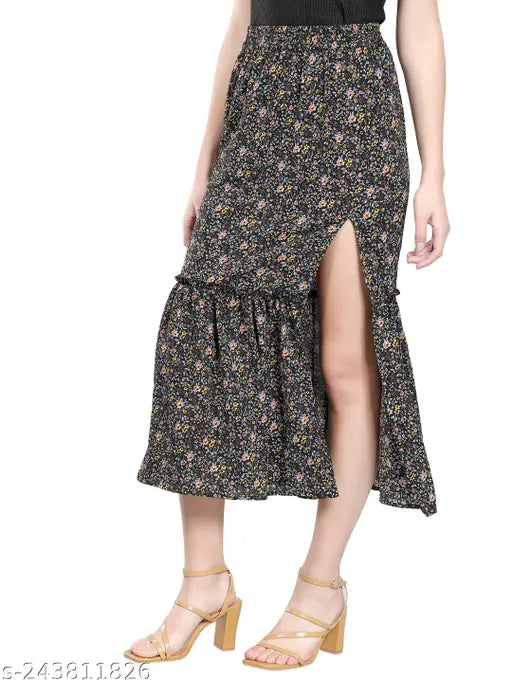 Black crepe floral printed side slit frill skirt with ruffles and elastic waist, ideal for casual events. Sizes: 30 (30waist32length), 32 (32waist32length). Made in India