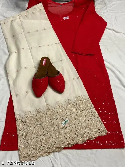 Red Chikankari cotton Kurta and Palazzo set with embroidered net, three-quarter sleeves, ready to wear for women's partywear. Made in India