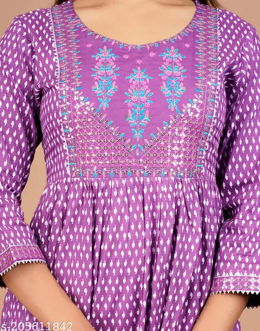 Purple embroidered rayon kurta with three-quarter sleeves and side slits, popular Indian women's fashion on mannequin