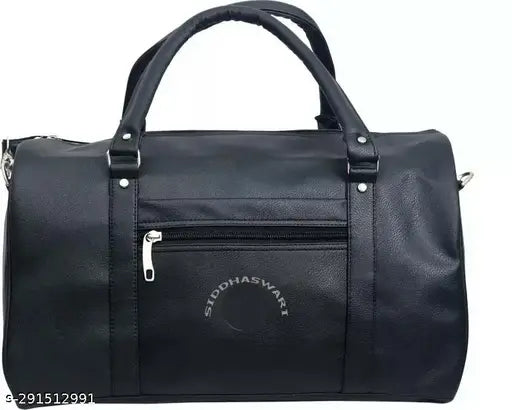 Black faux leather duffel bag for travel, regular capacity with 1 compartment and free size dimensions (18in x 12in x 3in). Indian-made travel bag on luggage stand
