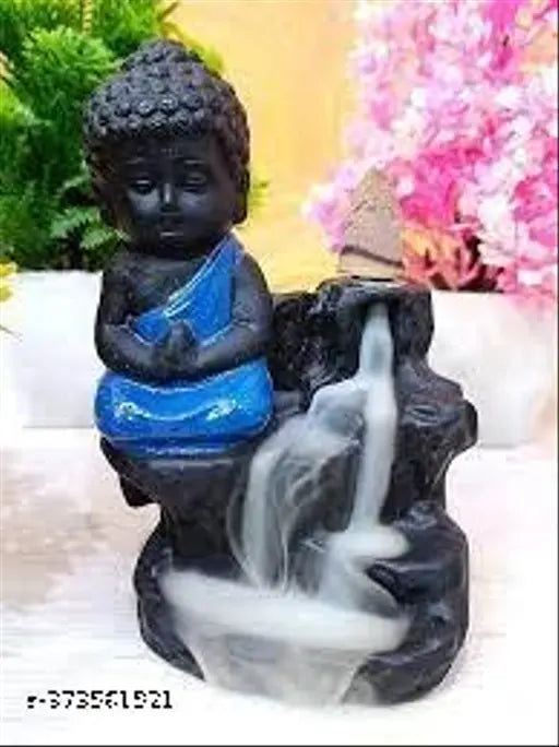 Black polyresin marble dust idols: Handcrafted combo of Lord Ganesh & Buddha, includes 51 free incense cones, dimensions - 7cmX9cmX12cm