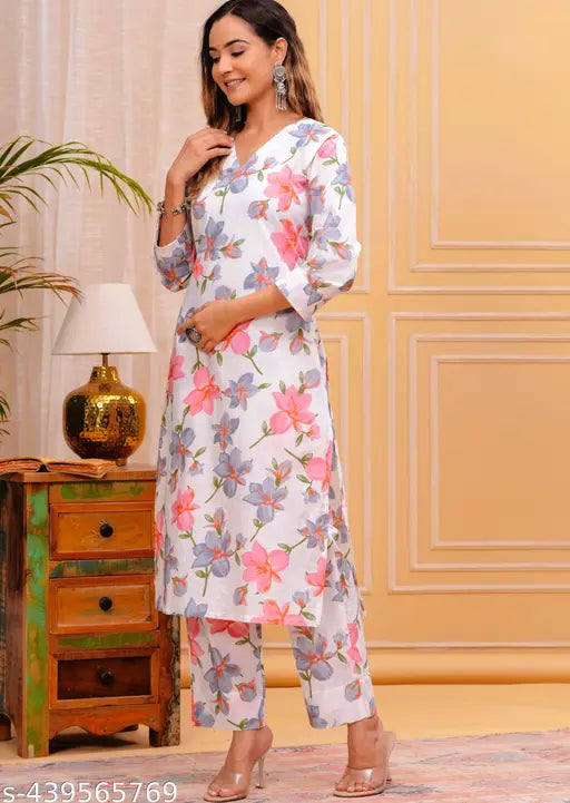 Designer women's floral print cotton calf length kurta with Palazzo set, pure cotton, 3/4 sleeves, v-neck, comfortable elasticated waistband. Available in various sizes from M to 7XL, originates from India
