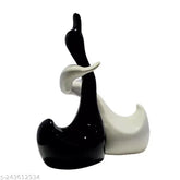 Black and white ceramic hugging swan sculptures, modern romantic home decor for office or desk