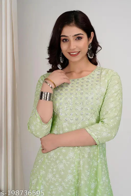 Rayon Chamaki Pista Anarkali Style 84 Kurti with three-quarter sleeves, printed combo design for women and girls. Beautiful new Indian design with chamaki print, zari embroidery, and pani color gota and samosa lace. Sizes available from S to 5XL