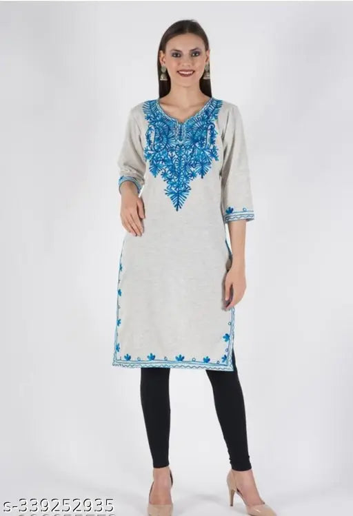 Fashionable woolen kurti with three-quarter sleeves, solid design. Handmade Aari work embroidery on Indian-made wool fabric. Perfect for chilly winter days. Size M (Bust 40", Length 42"), L (Bust 42", Length 42"), XL (Bust 44", Length 42")