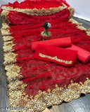 Red net saree with beads and stones, embroidered Banarasi silk blouse from Begumpuri, Indian traditional attire on display