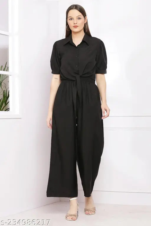 Black color women's solid 2-piece crepe jumpsuits, short sleeves, available in sizes S, M, L, XL on mannequin