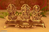 Golden metal idol of Ganesha, Lakshmi, and Saraswati from India, 10cm x 10cm x 20cm single pack
