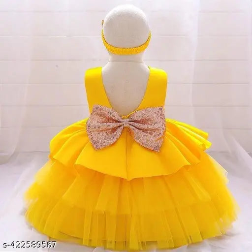 Yellow net frock for baby girl, sleeveless and solid pattern, size 0-1 years (22in), made in India