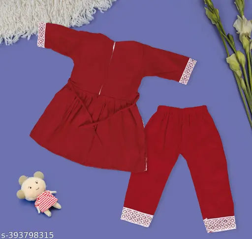 Beautiful yellow rayon kurti set for girls, trendy Naira style with A-line pyjama bottoms. Embroidered top, three-quarter sleeves. Suitable for kids parties, gentle on delicate skin." (125 characters)