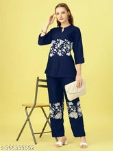 Viscose rayon mandarin collar top & bottom sets for women, featuring short sleeves and a variety of sizes from M to XXL. Made in India