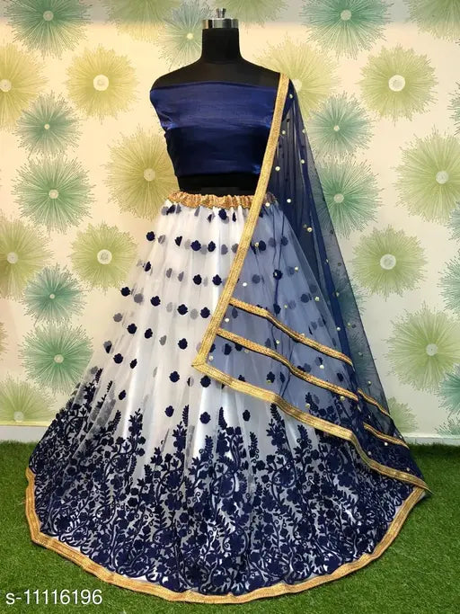 Embroidered taffeta silk lehenga choli for women with net dupatta, featuring lace and embellishments. Semi-stitched (waist size 40in, length size 42in). Indian craftsmanship