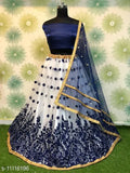 Embroidered taffeta silk lehenga choli for women with net dupatta, featuring lace and embellishments. Semi-stitched (waist size 40in, length size 42in). Indian craftsmanship