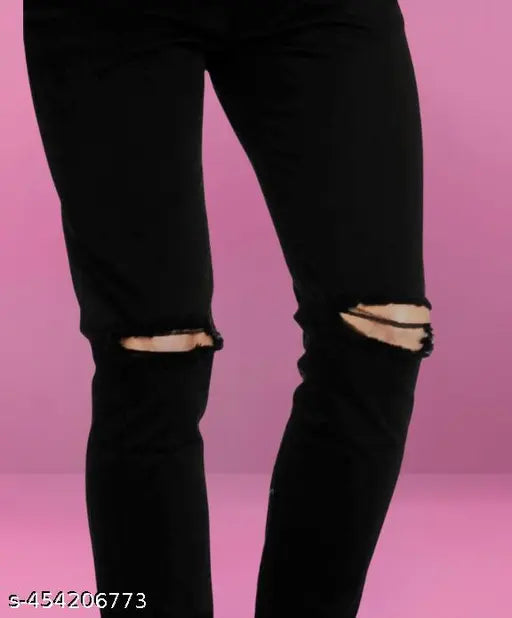 Stylish and comfortable knee-cut black denim jean for men & boys, sleek and versatile design suitable for casual and partywear. Black denim pant with mid rise and slim fit, available in sizes 26-32 (waist: 26-34 in, length: 39 in, hip: 28-30 in). Made in India