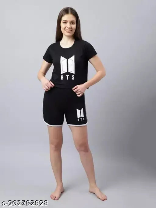 Black cotton blend BTS Night Suit set with short sleeve t-shirt and shorts featuring printed net design. Available in sizes XS to XL. Made in India