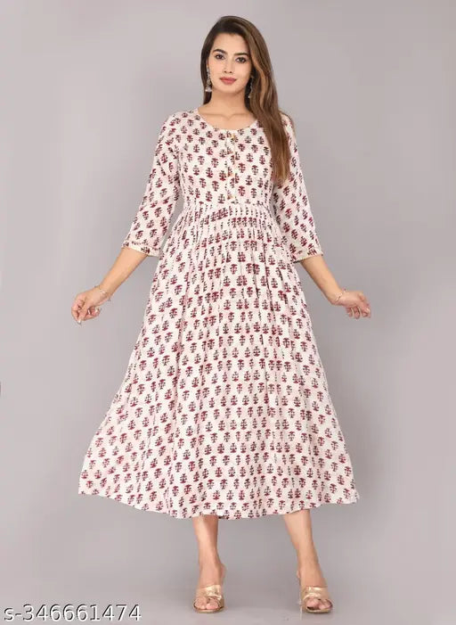 Rayon slub three-quarter sleeve printed anarkali dress in vibrant Indian print, model wearing size S