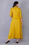 Yellow rayon embroidered kurti with three-quarter sleeves, ideal for women's fashion. India origin