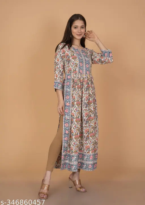 Rayon printed three-quarter sleeve Nyra cut kurti, vibrant combo. Indian ethnic fashion on model