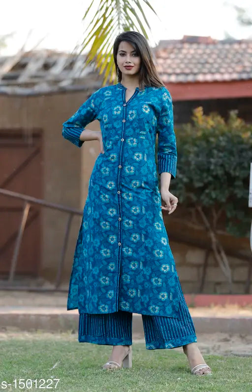 Women's printed cotton kurta with palazzos, three-quarter sleeves, vibrant Indian print on display