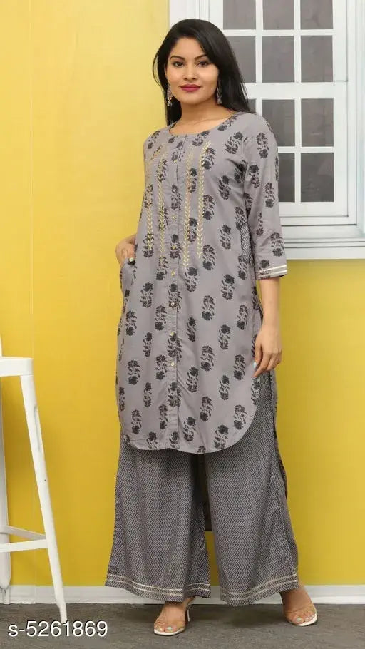 Women's printed rayon kurta with palazzos, rayon three-quarter sleeves in vibrant Indian print