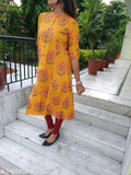 Mustard cotton A-line printed kurti for women, three-quarter sleeves, Indian origin