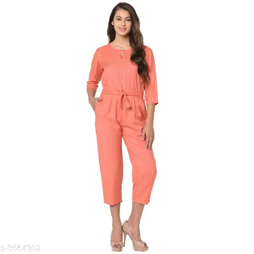 Trendy rayon women's jumpsuit, solid design in three-quarter sleeves. Made in India