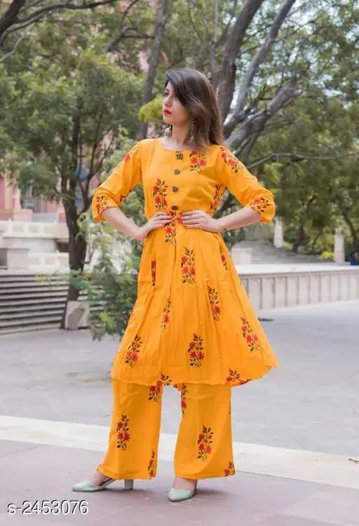 Women's cotton pleated printed long kurti with palazzos, three-quarter sleeves, vibrant Indian print