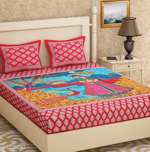 Colorful floral printed cotton double bedsheet with matching pillow covers, vibrant and intricate design on a comfortable 104 thread count bed set from India