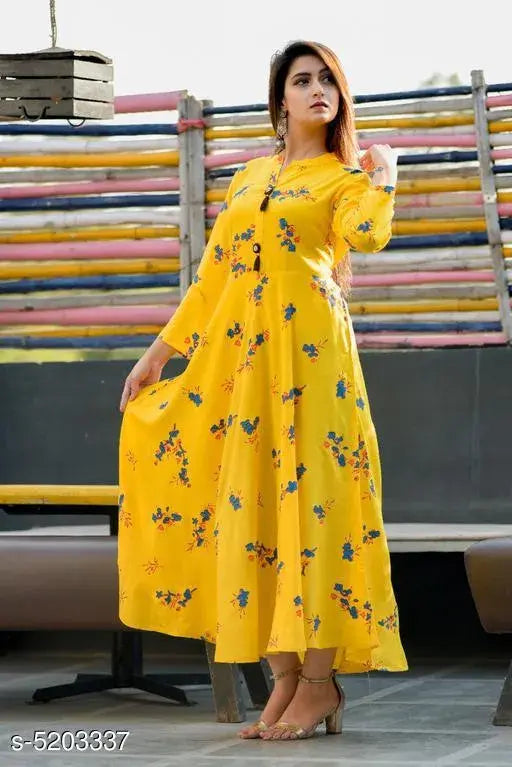 Yellow rayon flared printed kurti, three-quarter sleeves, vibrant Indian fashion