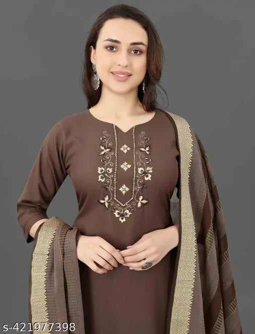 Embroidered cotton blend kurta with dupatta and bottomwear, three-quarter sleeves. Indian women's fashion set on mannequin