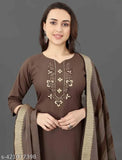 Embroidered cotton blend kurta with dupatta and bottomwear, three-quarter sleeves. Indian women's fashion set on mannequin