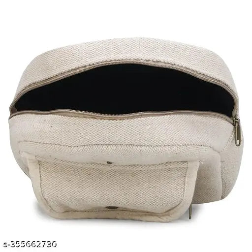 Eco-friendly hemp backpack, small and cute for picnic & outings. Durable fabric net with adjustable straps, features front buckle and zipper closure, perfect size (L: 20cm W: 5cm H: 24cm). Made in India