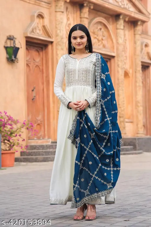 Premium designer cotton cambric embroidered anarkali gown with long sleeves, tassels, and sequins work, paired with a matching dupatta in Chinon silk, Indian origin