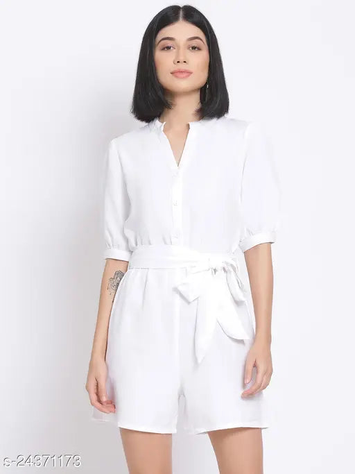 White polyester playsuit by Oxolloxo, mock collar with notched V-neckline and short puffed sleeves, includes matching belt. Basic yet chic, perfect for casual wear. Made in India